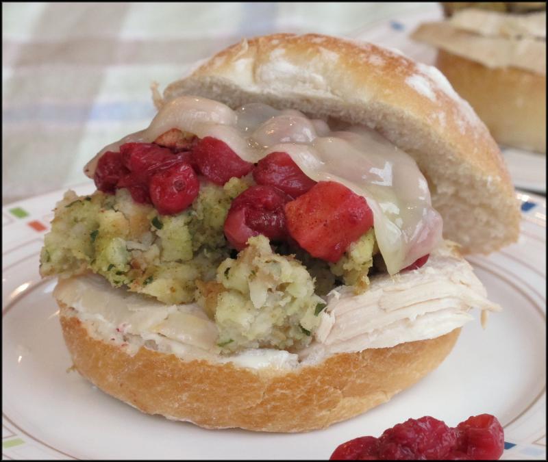 Thanksgiving leftovers sandwich (mayonnaise, turkey, stuffing, cranberry sauce and provolone cheese on a snowflake roll). JACK CLEMONS PHOTO